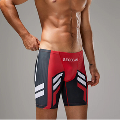 a sexy man in red Men’s Volt Strike Vortex Compression Swim Shorts – pridevoyageshop.com – gay men’s sexy swim briefs, trunks, board shorts, and bikinis