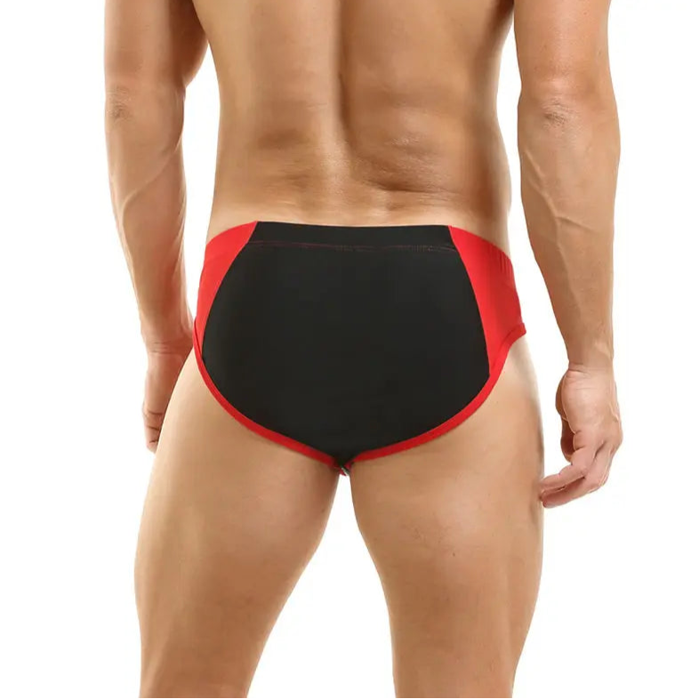 a sexy man in red Men’s Zip Me Up, Boy Swim Briefs - pridevoyageshop.com - gay men’s sexy swim briefs, trunks, board shorts, and bikinis