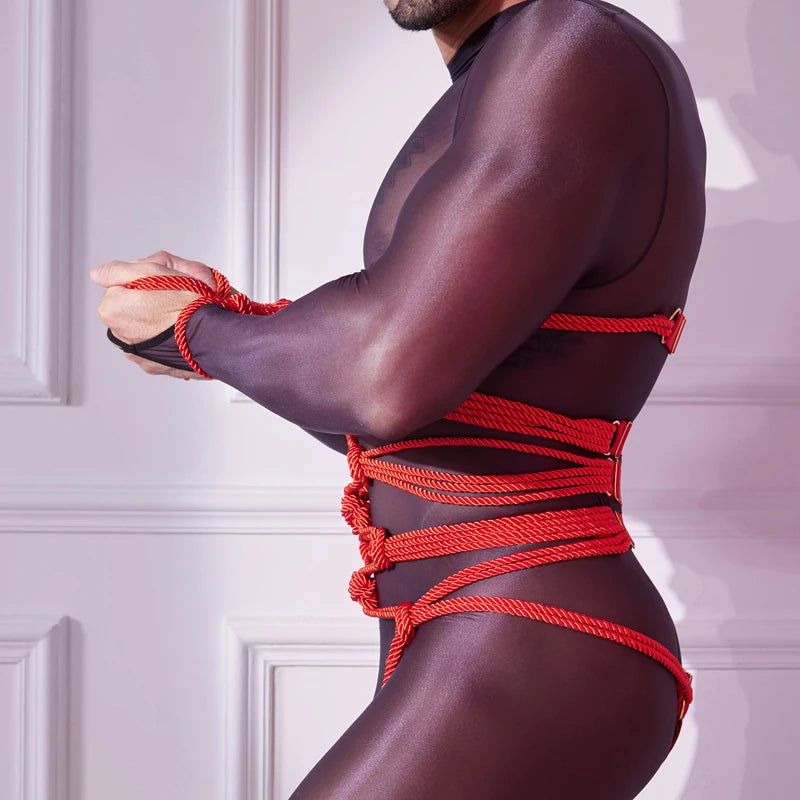 a sexy man in red Red Emperor’s Full Body Rope Harness – pridevoyageshop.com – gay men’s harness, lingerie and fetish wear
