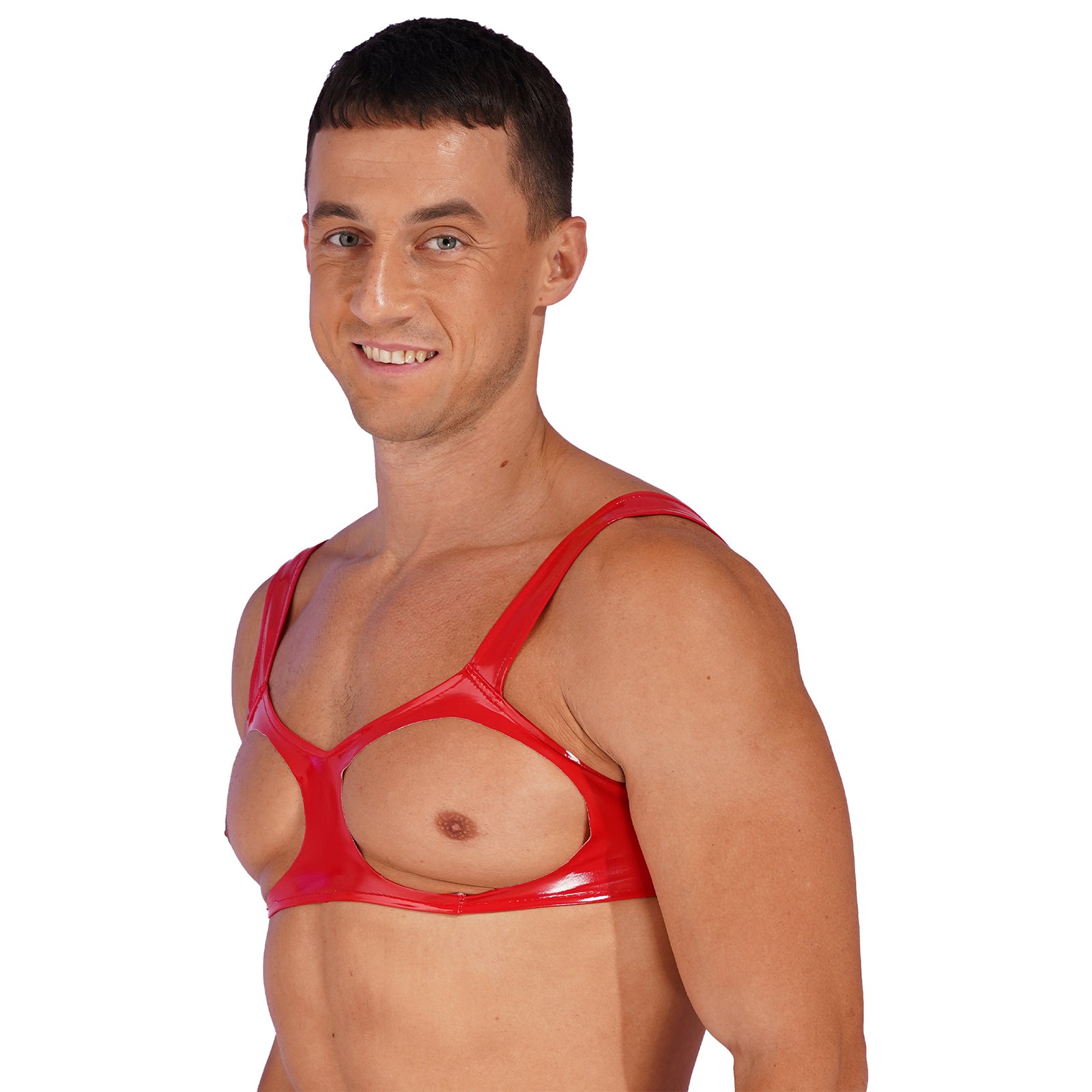 a sexy man in red glossy vinyl harness with bold chest strapping and metal buckle hardware – pridevoyageshop.com – gay men’s harness, lingerie and fetish wear