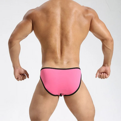 a sexy man in rose red Men’s Slick Split-Panel Swim Briefs - pridevoyageshop.com - gay men’s sexy swim briefs, trunks, board shorts, and bikinis