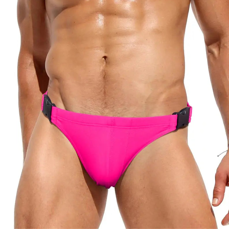 a sexy man in rose red Men’s Unclip Me Double Buckle Swim Briefs - pridevoyageshop.com - gay men’s sexy swim briefs, trunks, board shorts, and bikinis