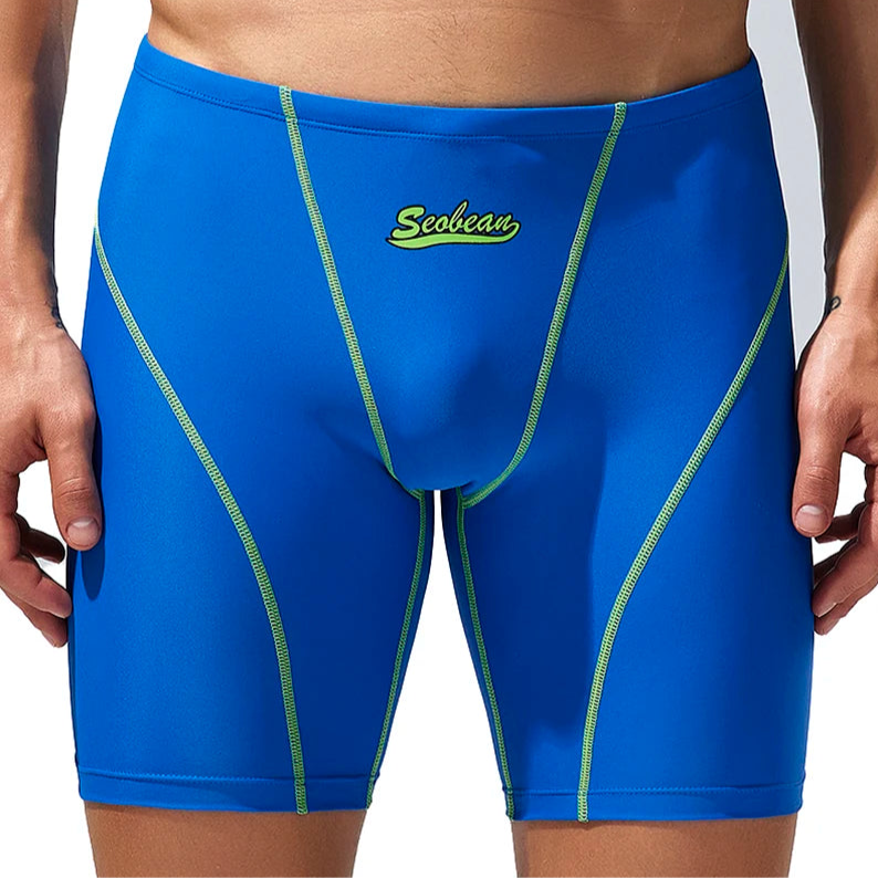 a sexy man in royal blue Men’s Code Lock Speed Vortex Compression Swim Shorts – pridevoyageshop.com – gay men’s sexy swim briefs, trunks, board shorts, and bikinis