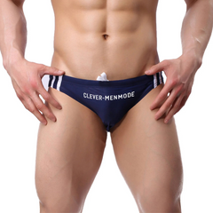 a sexy man in sapphire Men’s Jock Strut Swim Briefs - pridevoyageshop.com - gay men’s sexy swim briefs, trunks, board shorts, and bikinis