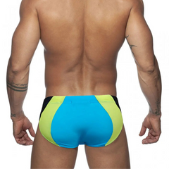 a sexy man in sky blue Men’s Colorblock Bulge-Boost Swim Briefs - pridevoyageshop.com - gay men’s sexy swim briefs, trunks, board shorts, and bikinis