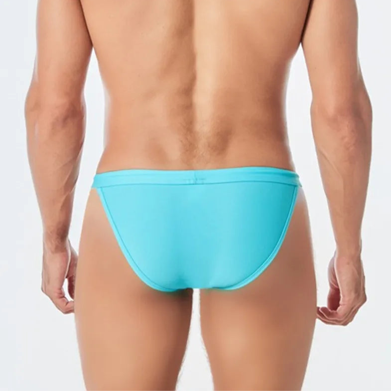 a sexy man in sky blue Men’s Show Pony Drawstring Swim Briefs - pridevoyageshop.com - gay men’s sexy swim briefs, trunks, board shorts, and bikinis