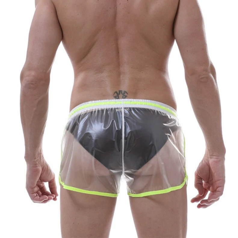 a sexy man in transparent Men’s Beach Shock Transparent Sheer Swim Trunks – pridevoyageshop.com – gay men’s sexy swim briefs, trunks, board shorts, and bikinis
