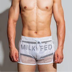 a sexy man in white DM Men’s Trade Bait See-Thru Mesh Shorts – pridevoyageshop.com – gay men’s sexy swim briefs, trunks, board shorts, and bikinis