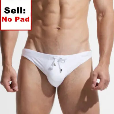 a sexy man in white Desmiit Men’s After Hours Aquatics Briefs - pridevoyageshop.com - gay men’s sexy swim briefs, trunks, board shorts, and bikinis