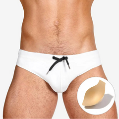 a sexy man in white Men’s Beach Brat Swim Briefs with pad - pridevoyageshop.com - gay men’s sexy swim briefs, trunks, board shorts, and bikinis