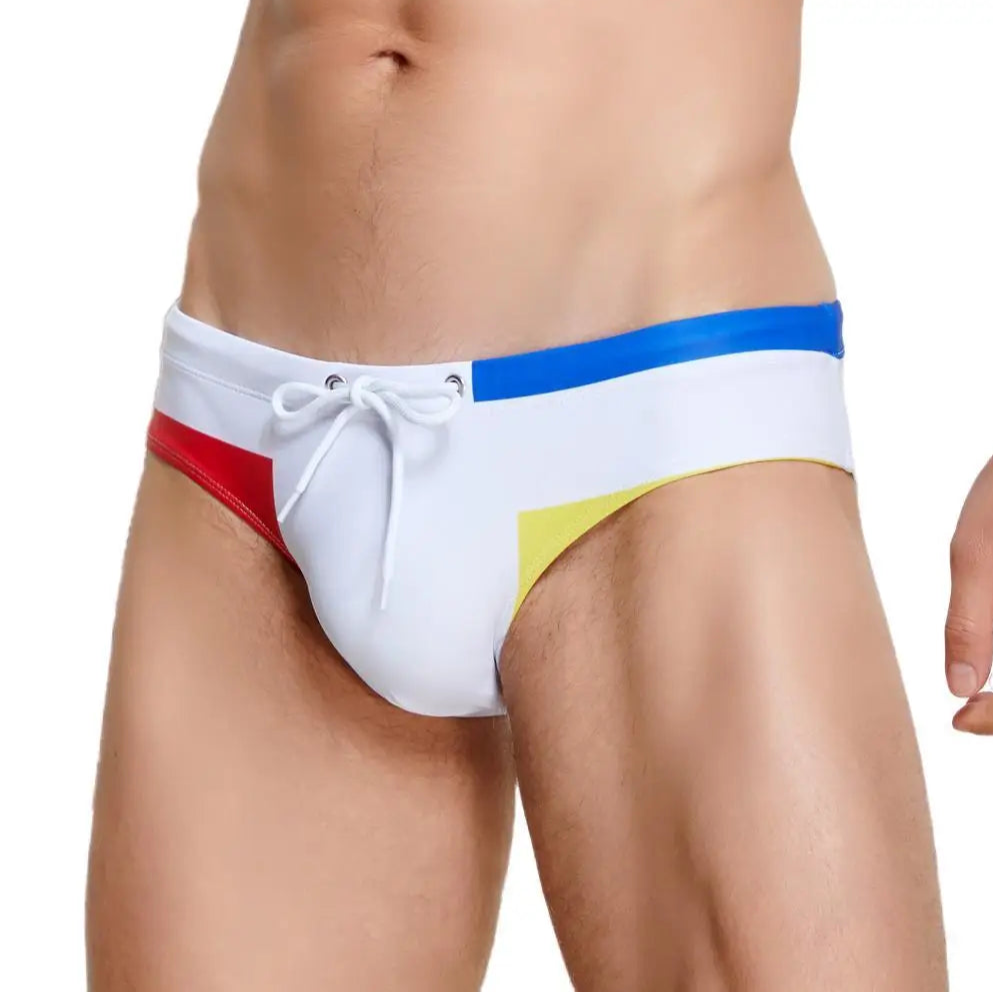 a sexy man in white Men’s Colorblock Bait Swim Briefs - pridevoyageshop.com - gay men’s sexy swim briefs, trunks, board shorts, and bikinis