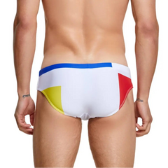 a sexy man in white Men’s Colorblock Bait Swim Briefs - pridevoyageshop.com - gay men’s sexy swim briefs, trunks, board shorts, and bikinis