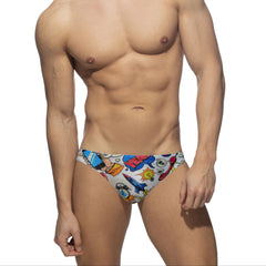 a sexy man in white Men’s Comic Crotch Swim Briefs - pridevoyageshop.com - gay men’s sexy swim briefs, trunks, board shorts, and bikinis