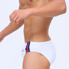 a sexy man in white Men’s Double Zipper Pouch Swim Briefs - pridevoyageshop.com - gay men’s sexy swim briefs, trunks, board shorts, and bikinis