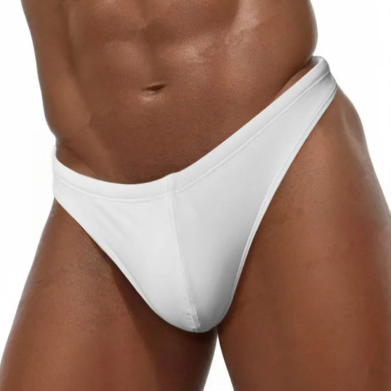 a sexy man in white Men’s Folsom Flash Micro Swim Bikini Thong – pridevoyageshop.com – gay men’s sexy swim briefs, trunks, board shorts, and bikinis