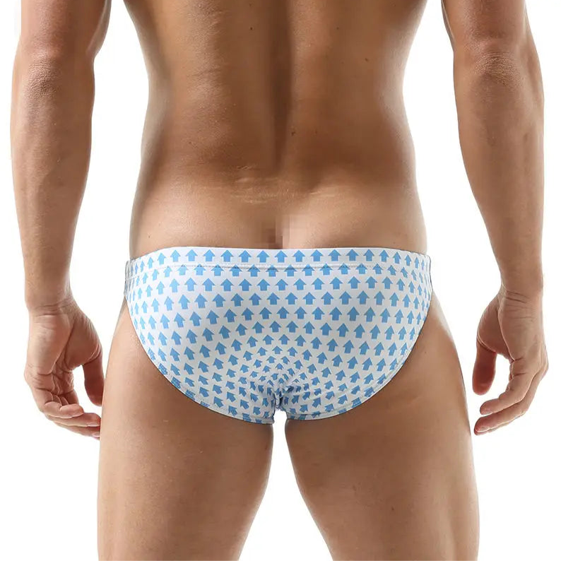 a sexy man in white Men’s Go Faster Swim Briefs - pridevoyageshop.com - gay men’s sexy swim briefs, trunks, board shorts, and bikinis