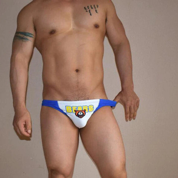 a sexy man in white Men’s Lil’ Bear Booty Swim Briefs - pridevoyageshop.com - gay men’s sexy swim briefs, trunks, board shorts, and bikinis