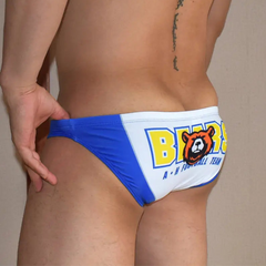a sexy man in white Men’s Lil’ Bear Booty Swim Briefs - pridevoyageshop.com - gay men’s sexy swim briefs, trunks, board shorts, and bikinis
