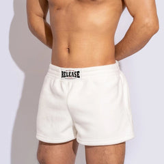 a sexy man in white Men’s Night Shift Fleece Lounge Shorts – pridevoyageshop.com – gay men’s sexy swim briefs, trunks, board shorts, and bikinis