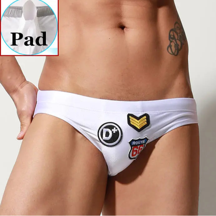 a sexy man in white Men’s Officer on Duty Low Rise Swim Briefs with pad - pridevoyageshop.com - gay men’s sexy swim briefs, trunks, board shorts, and bikinis