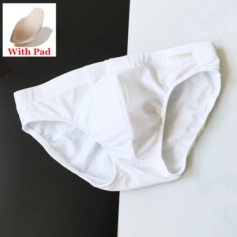 a sexy man in white Men’s Pool Plumper Padded Swim Briefs - pridevoyageshop.com - gay men’s sexy swim briefs, trunks, board shorts, and bikinis

