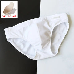 a sexy man in white Men’s Pool Plumper Padded Swim Briefs - pridevoyageshop.com - gay men’s sexy swim briefs, trunks, board shorts, and bikinis
