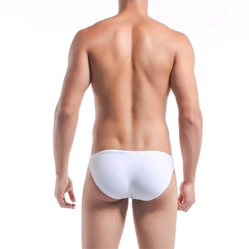 a sexy man in white Men’s Power Split Swim Briefs - pridevoyageshop.com - gay men’s sexy swim briefs, trunks, board shorts, and bikinis