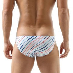 a sexy man in white Men’s Rainbow Ripple Pride Swim Briefs - pridevoyageshop.com - gay men’s sexy swim briefs, trunks, board shorts, and bikinis