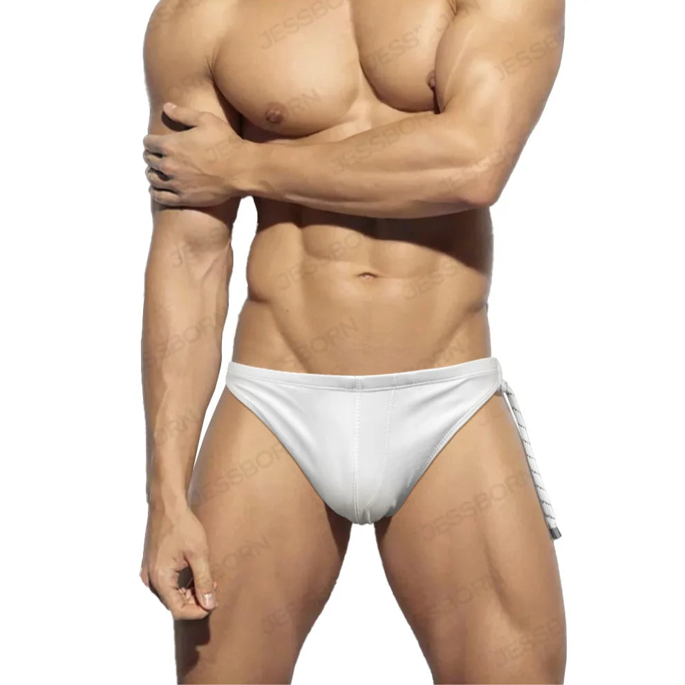 a sexy man in white Men's Rope Me Up Side Tether Swim Briefs - pridevoyageshop.com - gay men’s sexy swim briefs, trunks, board shorts, and bikinis