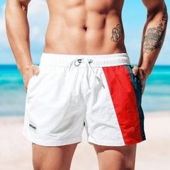 a sexy man in white Men’s Signal Swim Beach Board Shorts – pridevoyageshop.com – gay men’s sexy swim briefs, trunks, board shorts, and bikinis