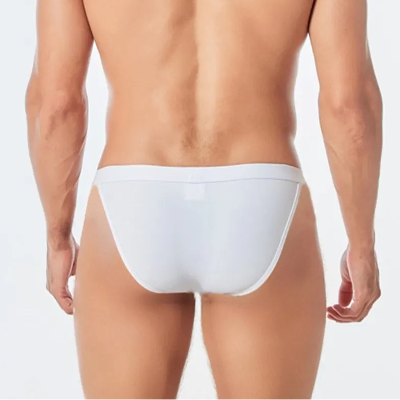 a sexy man in white Men’s Thigh High Rider Swim Briefs - pridevoyageshop.com - gay men’s sexy swim briefs, trunks, board shorts, and bikinis