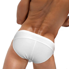 a sexy man in white Men’s Unclip Me Double Buckle Swim Briefs - pridevoyageshop.com - gay men’s sexy swim briefs, trunks, board shorts, and bikinis