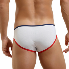 a sexy man in white Men’s Varsity Mesh Swim Briefs – pridevoyageshop.com – gay men’s sexy swim briefs, trunks, board shorts, and bikinis