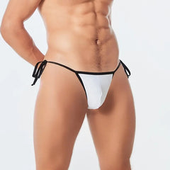 a sexy man in white Men’s Werk It Tie-Up Swim Bikini Thong – pridevoyageshop.com – gay men’s sexy swim briefs, trunks, board shorts, and bikinis