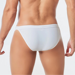 a sexy man in white Men’s Wet Package Micro Swim Briefs - pridevoyageshop.com - gay men’s sexy swim briefs, trunks, board shorts, and bikinis