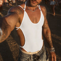 a sexy man in white Night Shift Keyhole Halter Bodysuit with chest cut-out and sleek halter fit accentuating defined torso – pridevoyageshop.com – gay men’s harness, lingerie and fetish wear