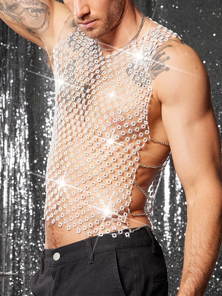 a sexy man in white crystal net tank revealing defined chest and shimmering rhinestones – pridevoyageshop.com – gay men’s harness, lingerie and fetish wear