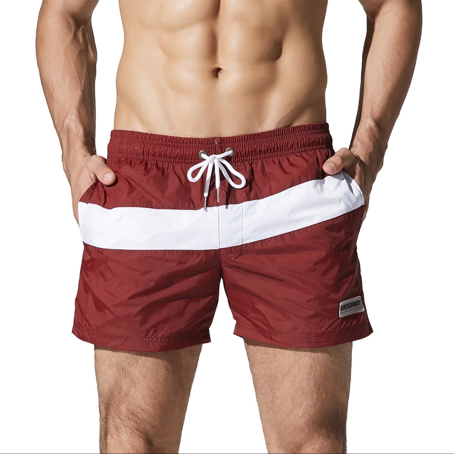 a sexy man in wine red Men’s Block Party Volley Swim Short – pridevoyageshop.com – gay men’s sexy swim briefs, trunks, board shorts, and bikinis