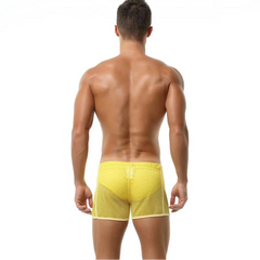 a sexy man in yellow Men’s Beacon Cruise Mesh Shorts – pridevoyageshop.com – gay men’s sexy swim briefs, trunks, board shorts, and bikinis