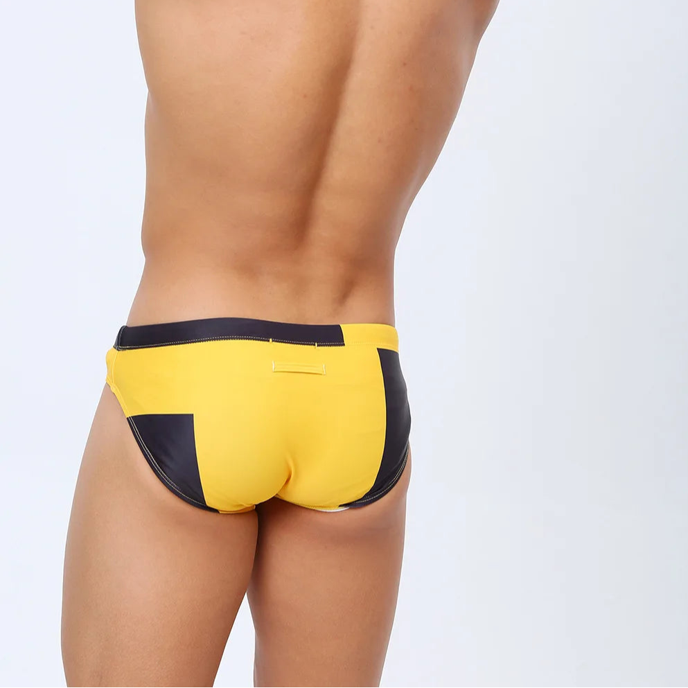 a sexy man in yellow Men’s Cubed Up & Thirsty Swim Briefs - pridevoyageshop.com - gay men’s sexy swim briefs, trunks, board shorts, and bikinis