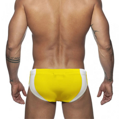 a sexy man in yellow Men’s Daddy Discipline Swim Briefs - pridevoyageshop.com - gay men’s sexy swim briefs, trunks, board shorts, and bikinis