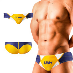 a sexy man in yellow Men’s Halftime Hard-On Swim Briefs - pridevoyageshop.com - gay men’s sexy swim briefs, trunks, board shorts, and bikinis