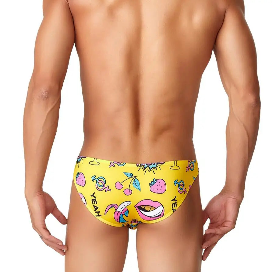 a sexy man in yellow Men’s Juicy Thirst Summer Swim Briefs - pridevoyageshop.com - gay men’s sexy swim briefs, trunks, board shorts, and bikinis