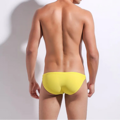 a sexy man in yellow Men’s Power Split Swim Briefs - pridevoyageshop.com - gay men’s sexy swim briefs, trunks, board shorts, and bikinis