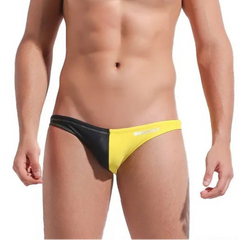 a sexy man in yellow Men’s Power Split Swim Briefs - pridevoyageshop.com - gay men’s sexy swim briefs, trunks, board shorts, and bikinis