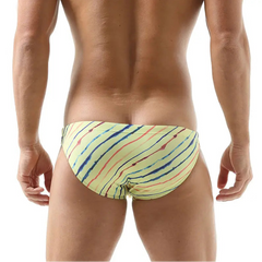 a sexy man in yellow Men’s Rainbow Ripple Pride Swim Briefs - pridevoyageshop.com - gay men’s sexy swim briefs, trunks, board shorts, and bikinis