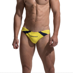 a sexy man in yellow Men’s Rival Jockline Bikini Swim Briefs - pridevoyageshop.com - gay men’s sexy swim briefs, trunks, board shorts, and bikinis