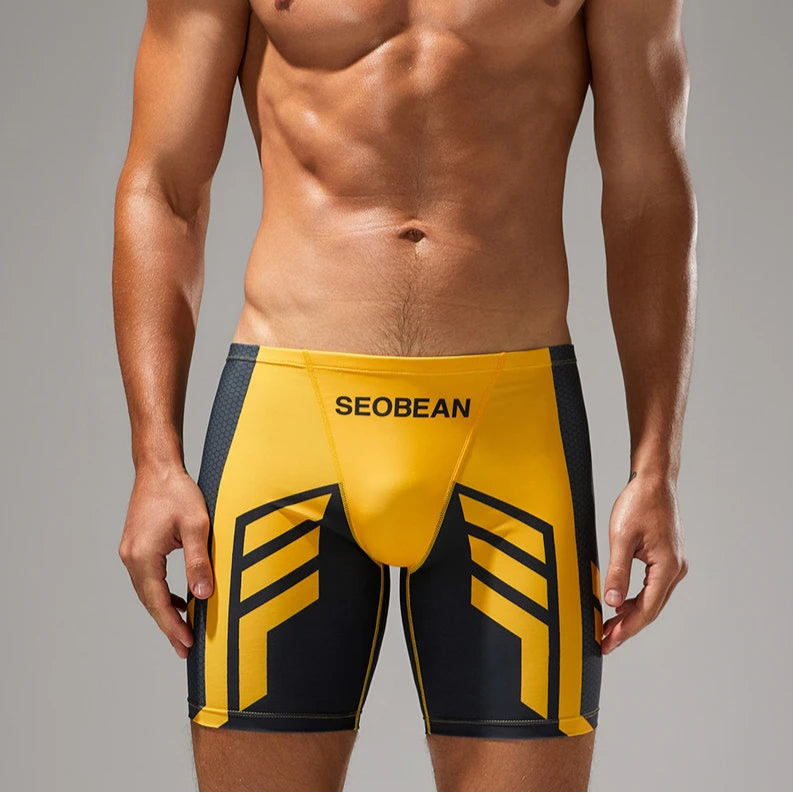 a sexy man in yellow Men’s Volt Strike Vortex Compression Swim Shorts – pridevoyageshop.com – gay men’s sexy swim briefs, trunks, board shorts, and bikinis