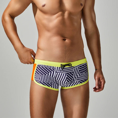 a sexy man in yellow side SEOBEAN Men’s Obey the Stripe Low Rise Swim Trunks – pridevoyageshop.com – gay men’s sexy swim briefs, trunks, board shorts, and bikinis