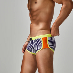 a sexy man in yellow side SEOBEAN Men’s Obey the Stripe Low Rise Swim Trunks – pridevoyageshop.com – gay men’s sexy swim briefs, trunks, board shorts, and bikinis